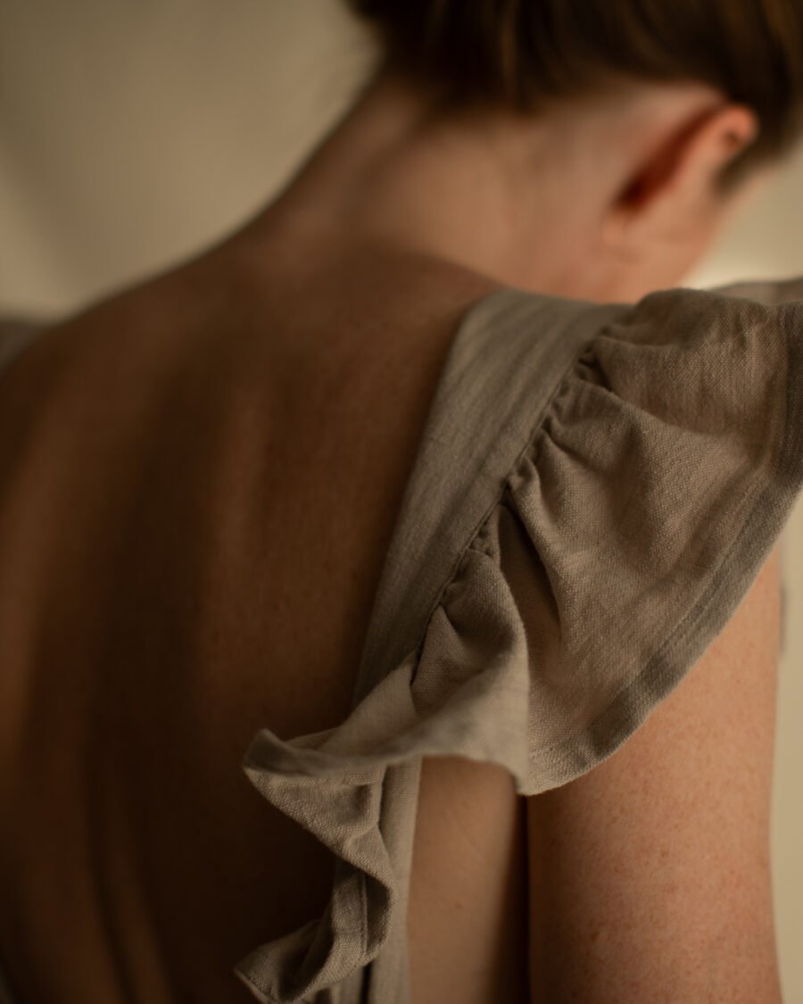 Close-up of neck and shoulder in warm natural light